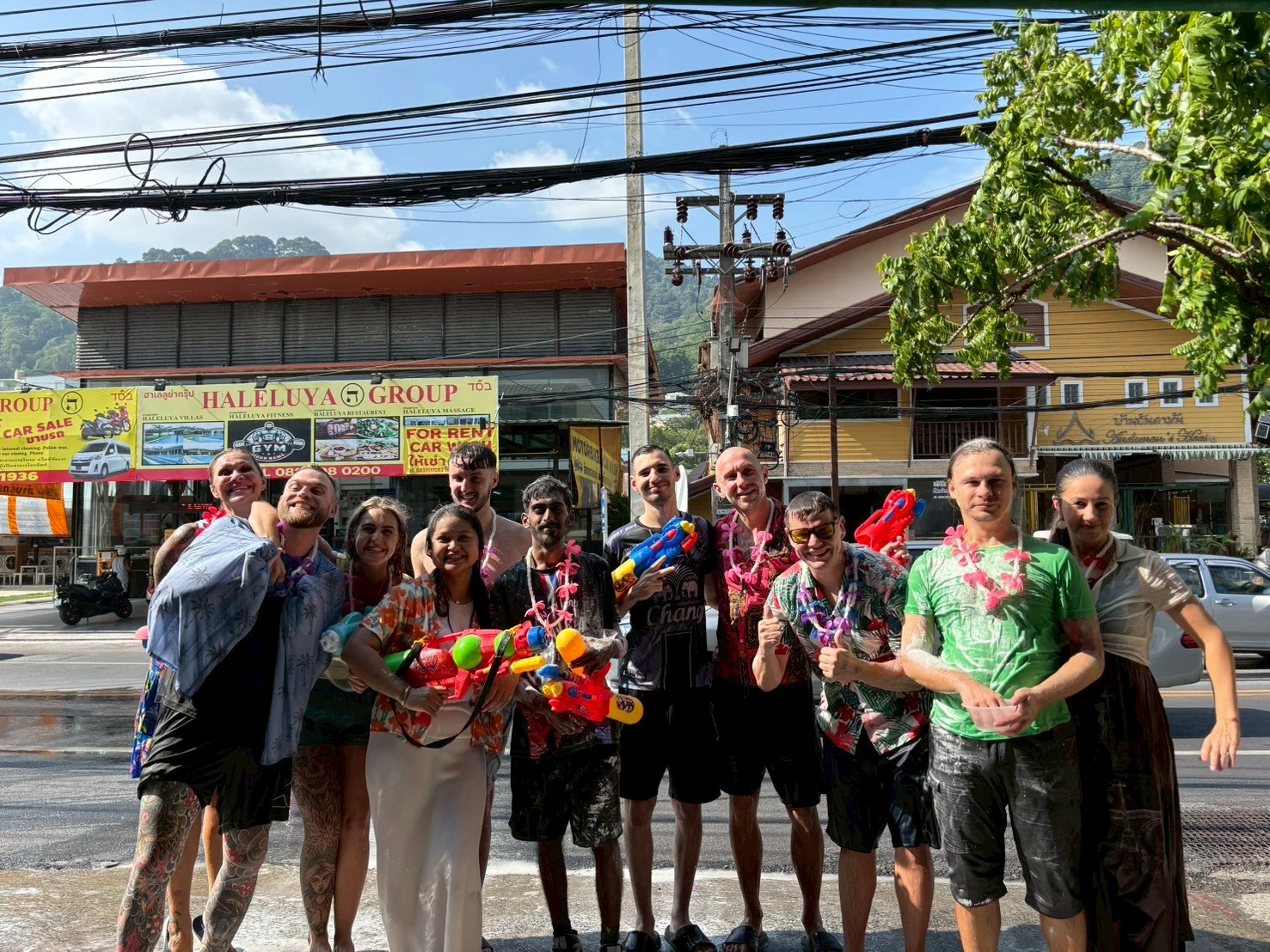 The Genius Language School - students and teachers posing for a pic during Songkran