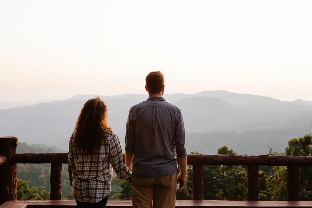 Man and a woman holding hands